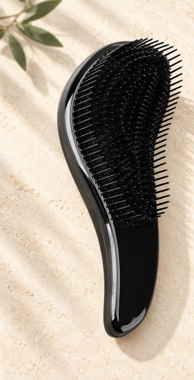 Brosse noire offerte avec l’huile Jessikhairshop